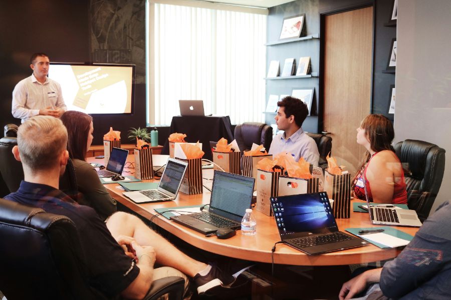 Colleagues working together in an open office